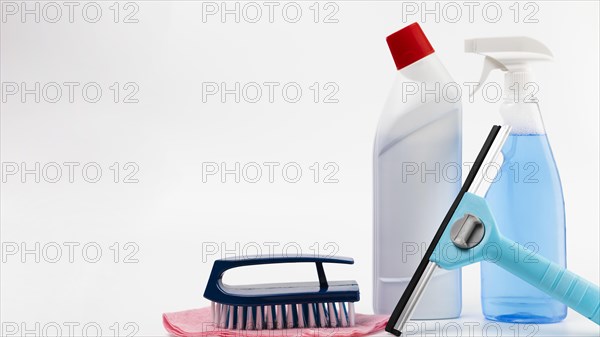 Arrangement with cleaning products white background