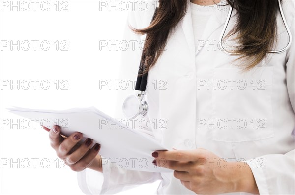 Female doctor holding medical report hand isolated white backdrop