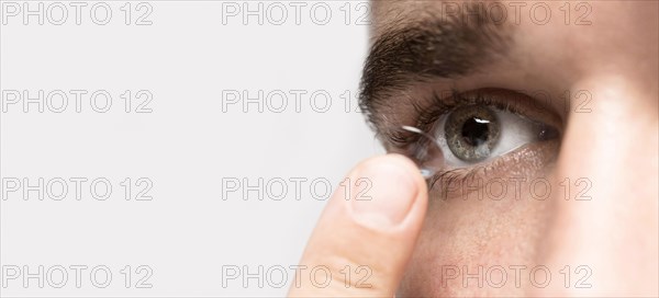 Man holding eye contact with copy space