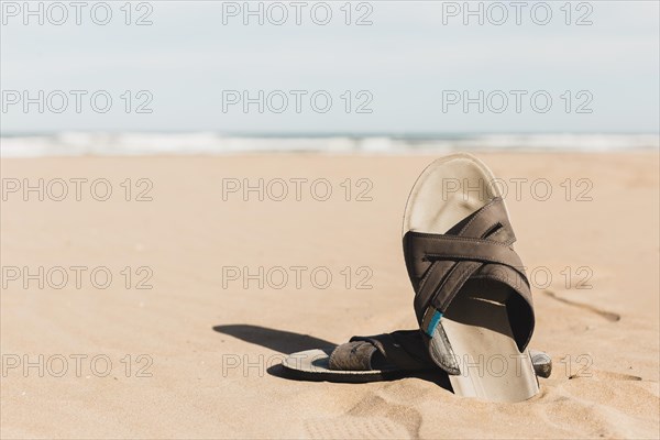 Beach concept with sandal