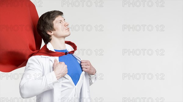 Man with red cape lab coat