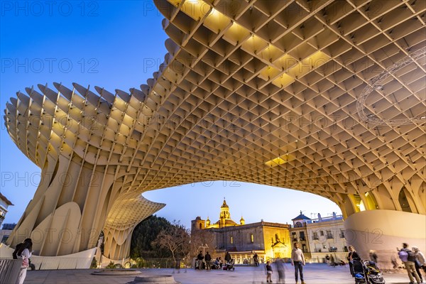 The futuristic wooden construction and observation deck Metropol Parasol at the Plaza de la Encarnacion at dusk