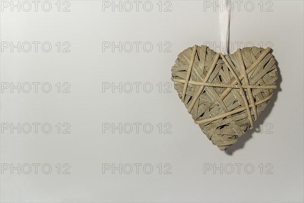 Braided heart on a gray background