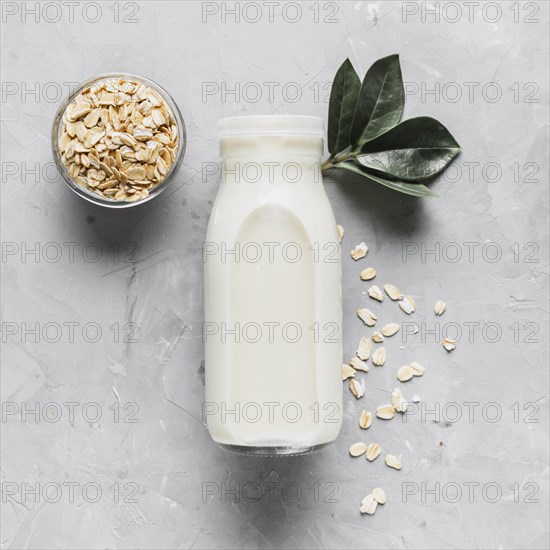 Top view milk bottle with oatmeal