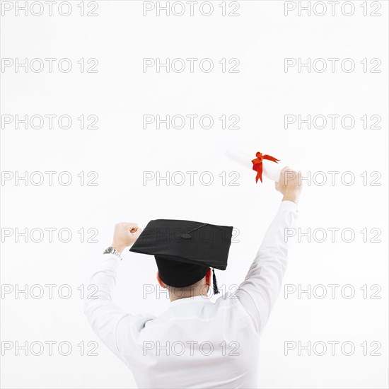 Unrecognizable man celebrating graduation