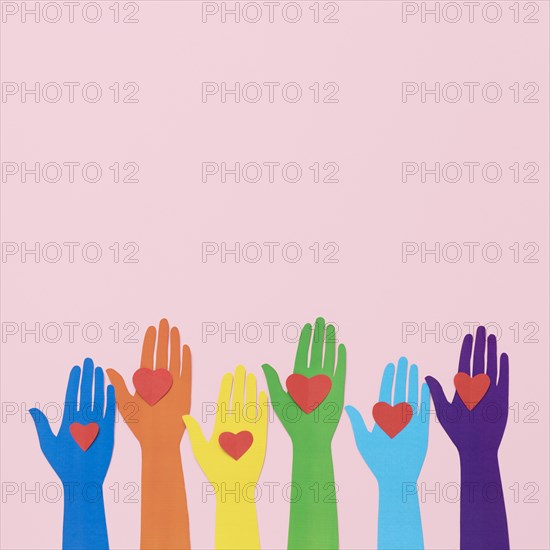Top view diversity composition different colored paper hands with copy space