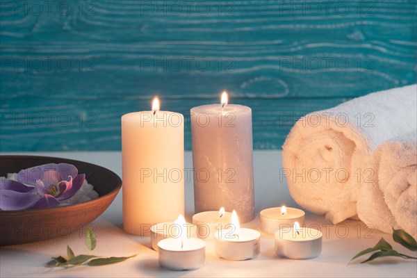 Spa wellness setting with sea salt illuminated candles