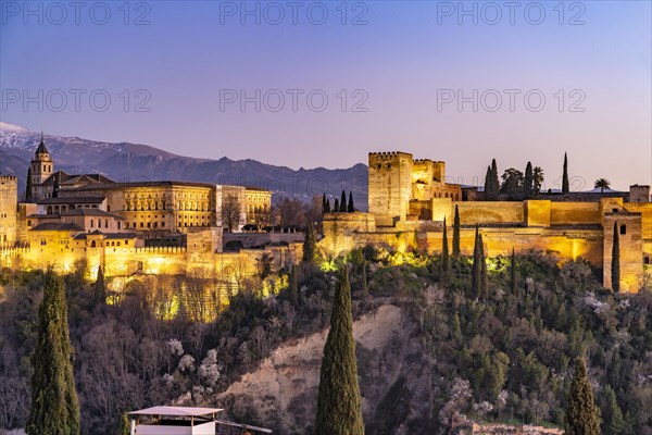 View of the Alhambra at dusk from the Mirador de San Nicolas