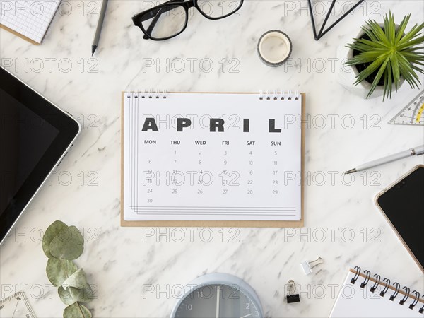 Top view desk april calendar