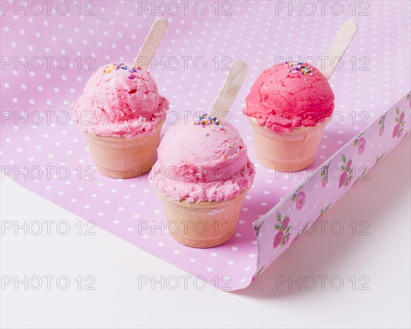 Cups with fruit ice cream table