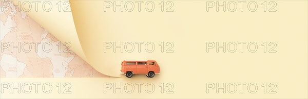 Travel concept with map toy van