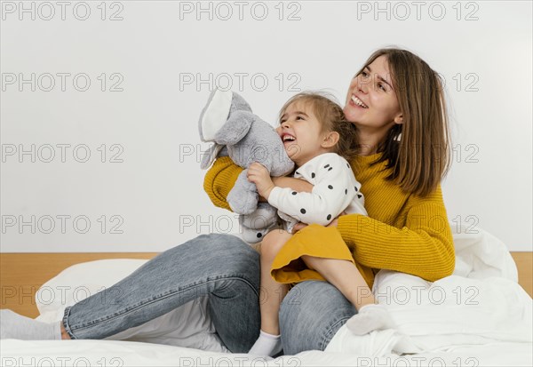 Full shot woman kid smiling