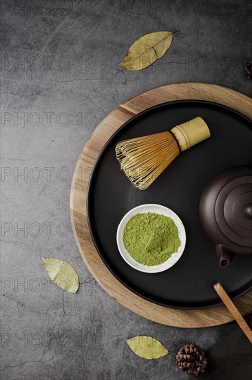 Top view matcha tea powder bamboo whisk