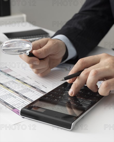 Business man calculating finance numbers
