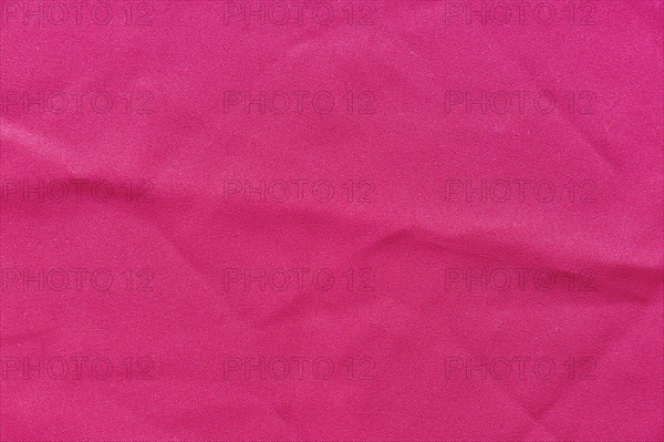 Full frame pink fabric background