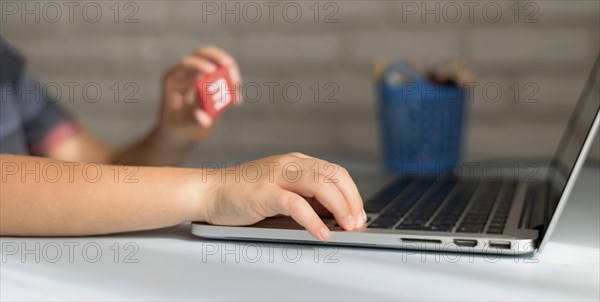 Little online student writing laptop