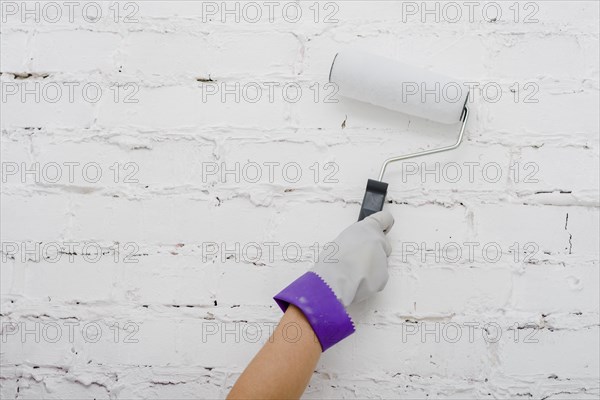 Crop hand painting wall