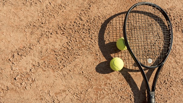 Tennis balls black racket