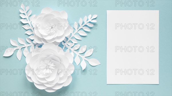Top view card with paper flowers women s day