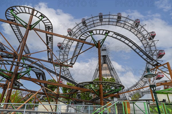 Rusty scaffolding and rails of an old roller coaster