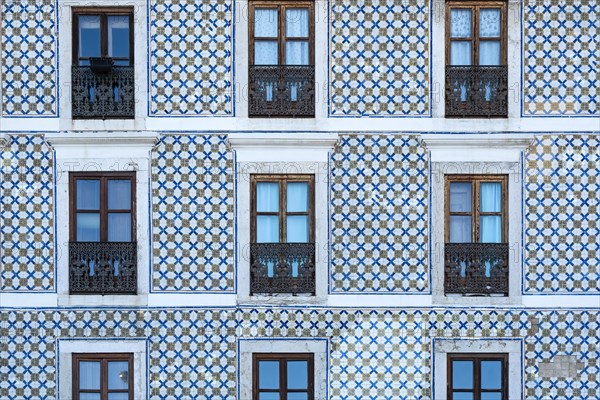 Facade with painted tiles