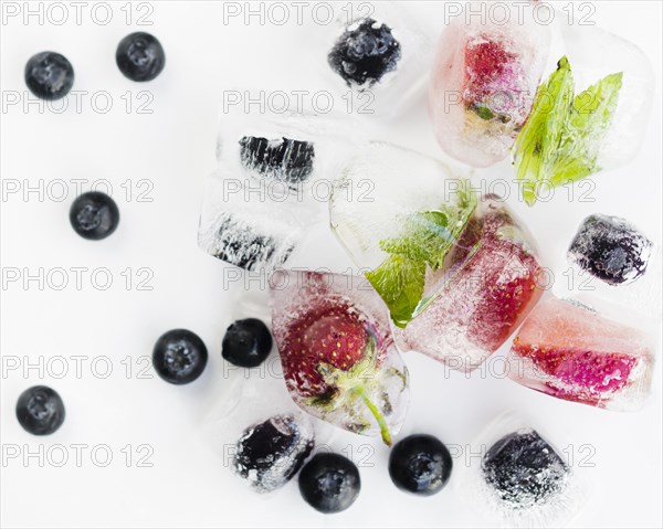 Berries ice white surface