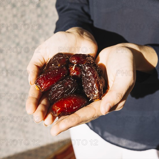 Muslim woman with dates