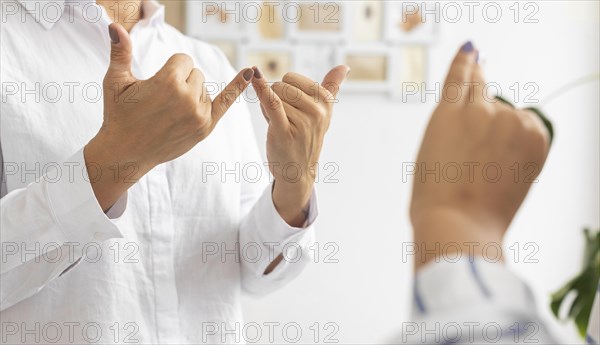 Group deaf people communicating through sign language