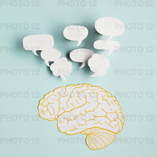 Paper brain with chat bubbles
