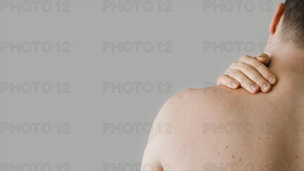Close up man with neck pain