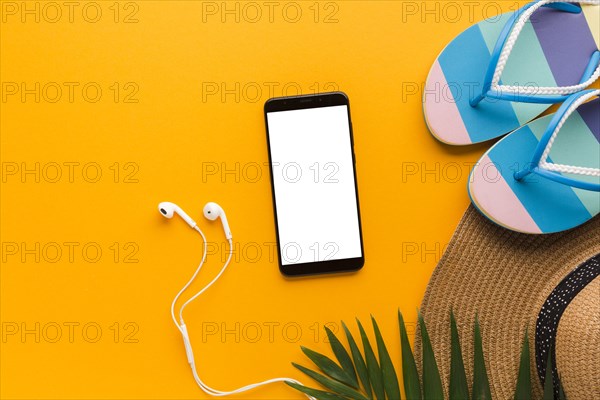 Flat lay smartphone with summer vacation concept