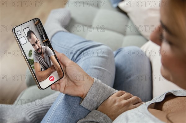 Woman talking video call with friend phone