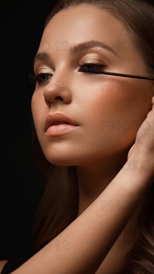 Beautiful young girl with a light natural make-up