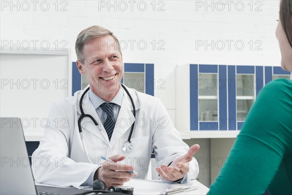 Doctor tending patient