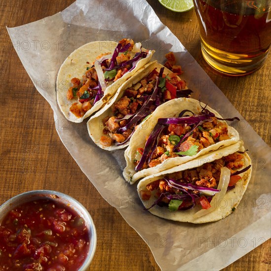 Delicious tacos with sauce arrangement