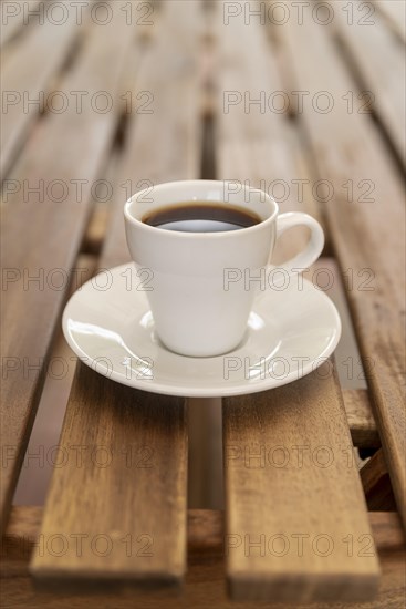 Minimalistic coffee cup wooden table