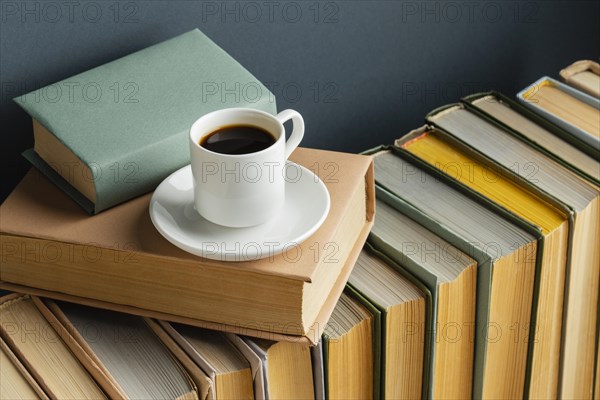Creative arrangement with different books coffee