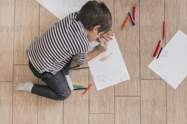 Little child painting like artist