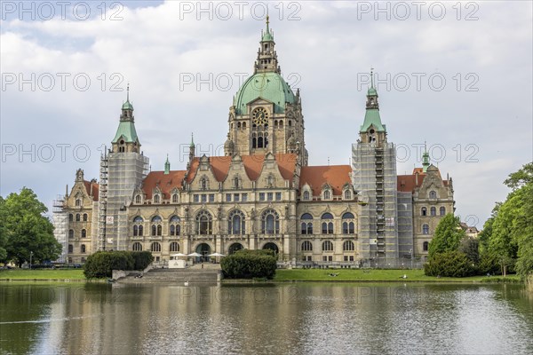 New Town Hall with reflection in the water at the Maschteich in the Maschpark