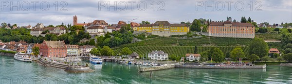 Town view of Meersburg on Lake Constance with landing stage and excursion boats