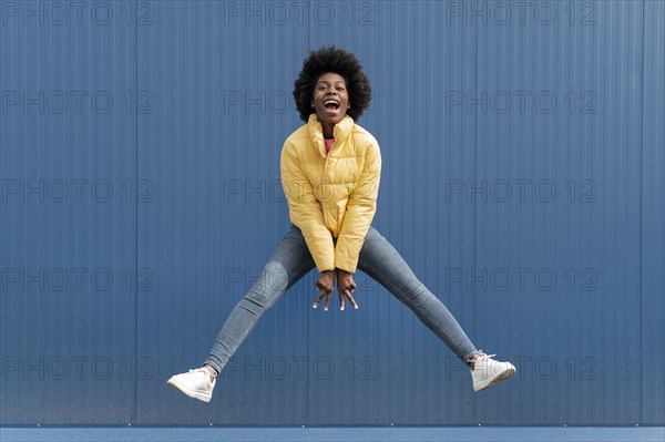 Portrait young female jumping2