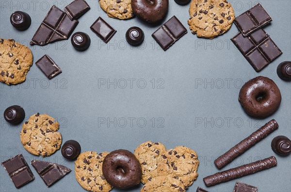 Top view circular frame with chocolate candies