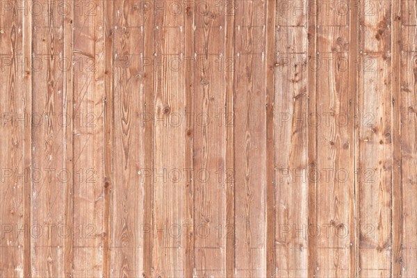 Light brown wooden background with vertical planks