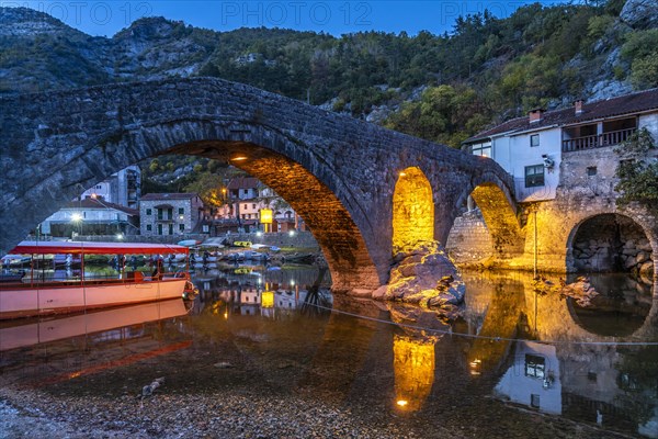 The Old Bridge Stari Most over the Crnojevic River in Rijeka Crnojevica at dusk