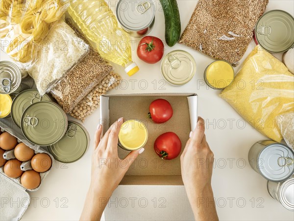 Flat lay fresh provisions donation with box