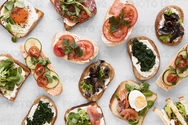 Top view fresh sandwiches arrangement white background