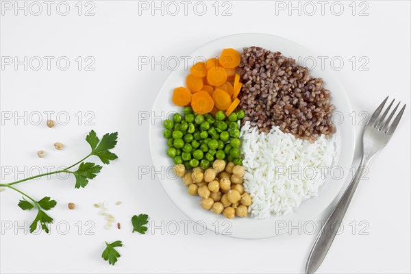 Different types porridge with vegetables plate