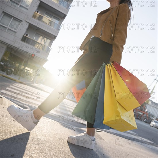 Lady shopping bags street