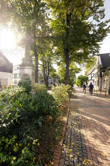 Cyclists in the old town of Monheim am Rhein