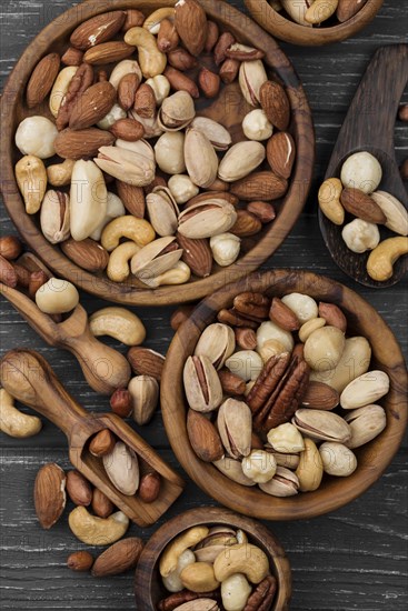 Assorted bowls delicious nuts snack